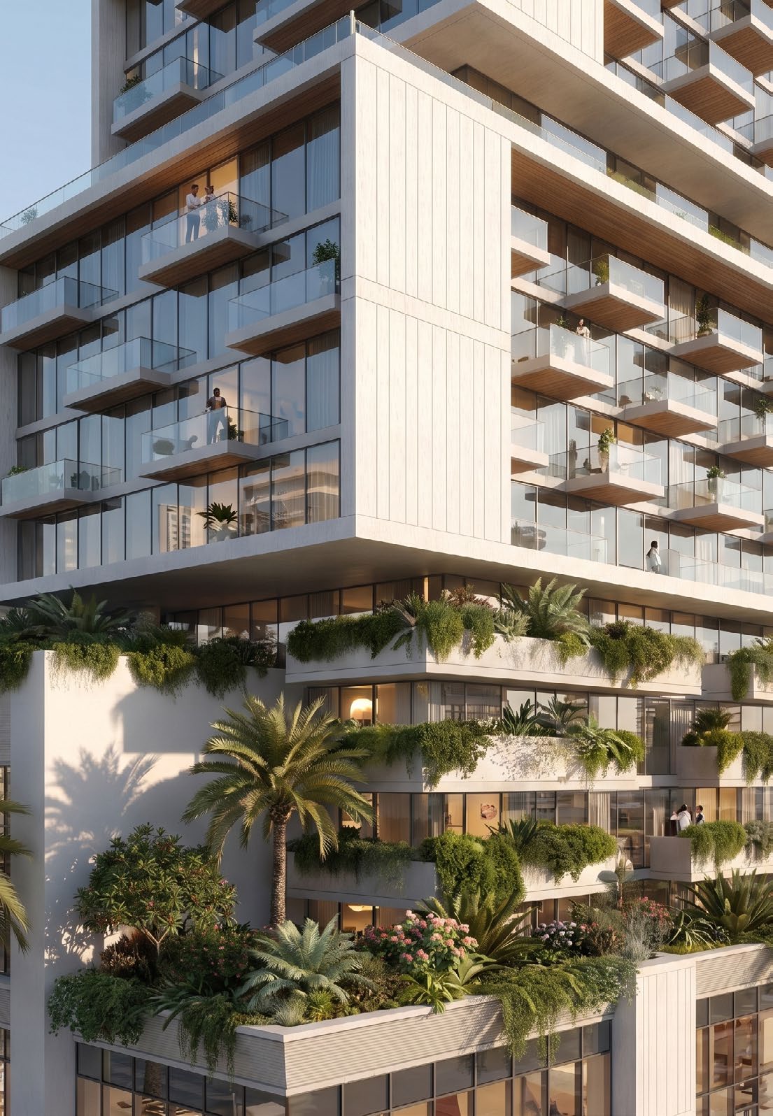 Residential facade with planted terraces and active podium levels.