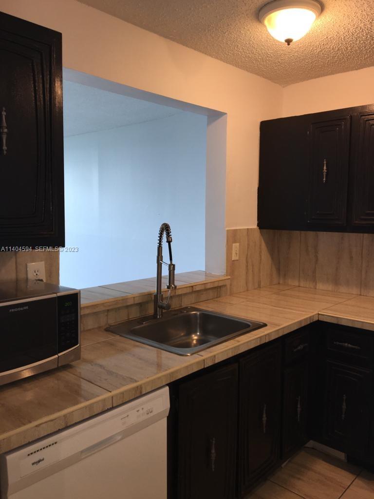 496 NW 165th St Rd # D312 — interior/exterior
